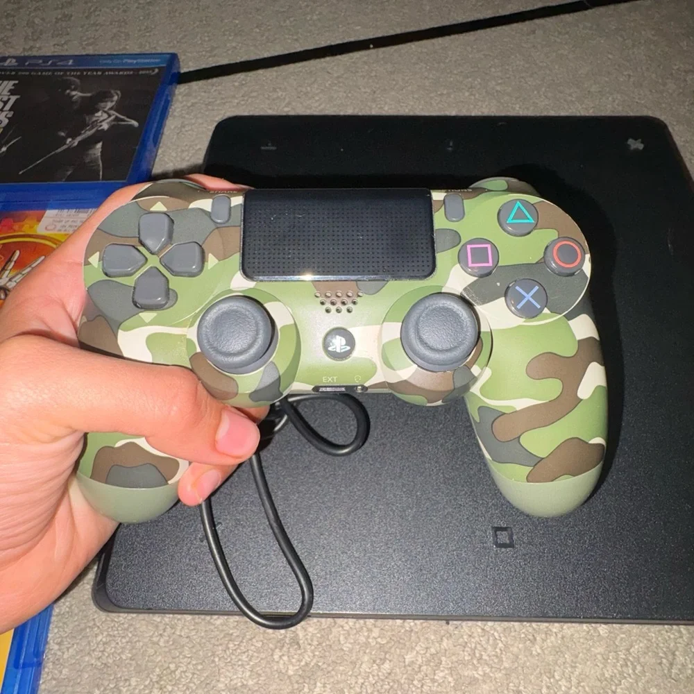 Ps4 with controller (including power cord and chargers) and 3 games